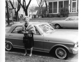 1966 May Grandma Em with car and mink.jpg